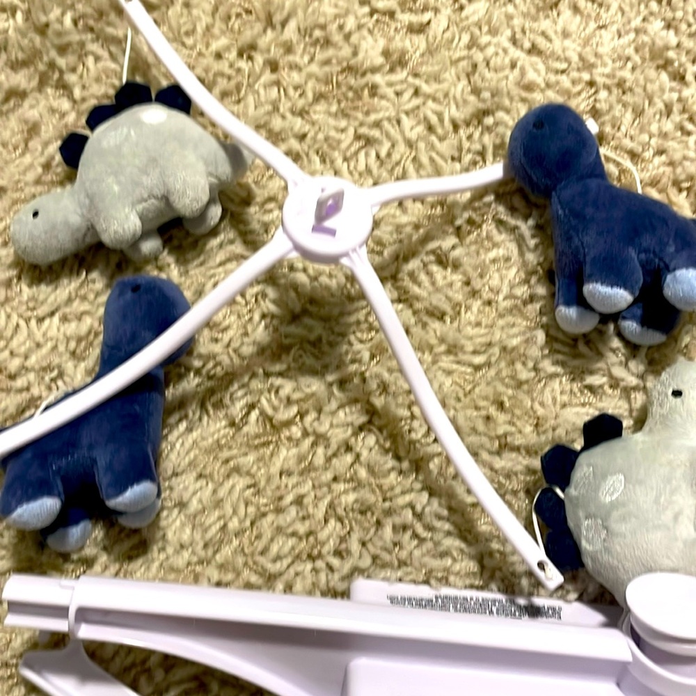 Lambs and ivy dinosaurs crib mobile